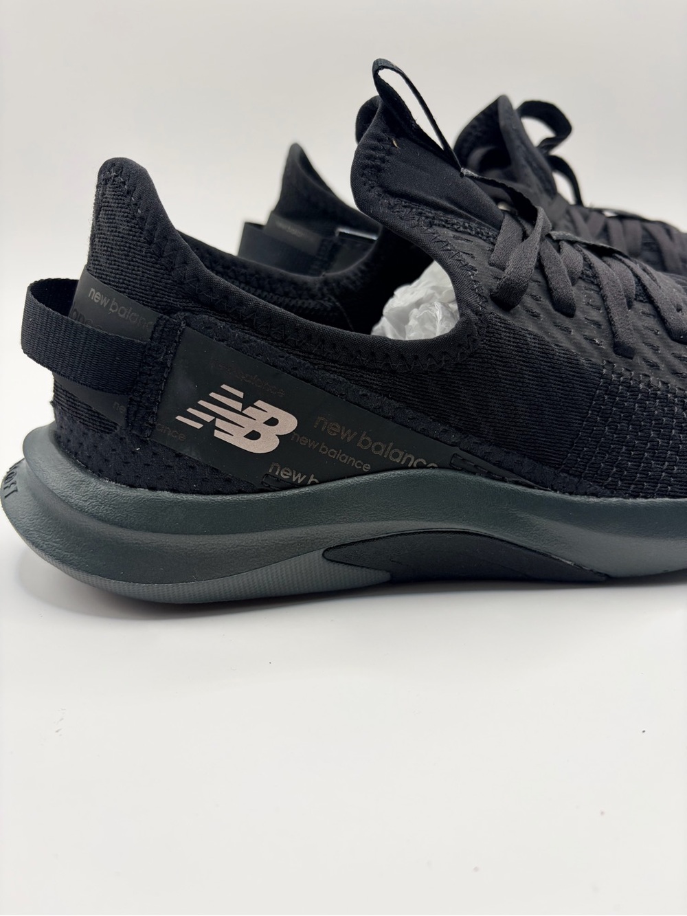 New Balance Women’s Black Knit Slip-On Sneakers with Dark Gray Sole